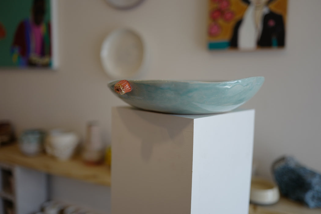 Hand sculpted vessel